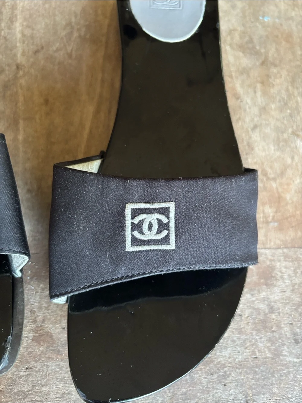 CHANEL Black Slide Sandals with White CC Logo